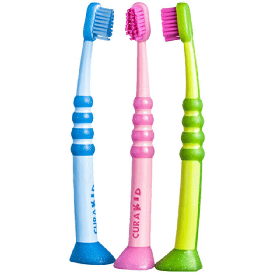 Brosse à dents Curaprox pour enfants de 0 à 4 ans, rose avec poils roses