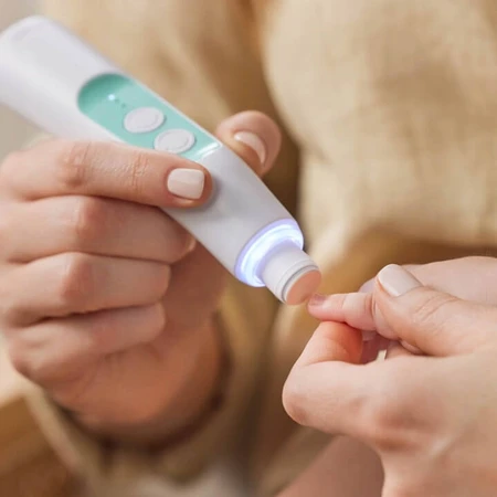 Frida Baby, electric nail file for children in a case