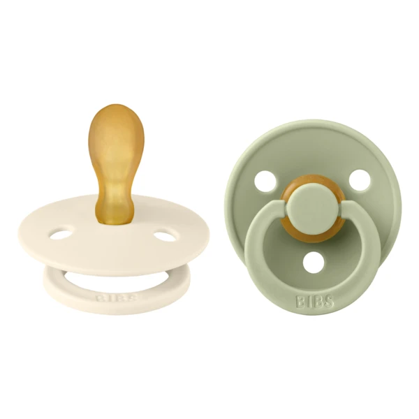 Set van 2 latex fopspenen met symmetrische speen Kleur Latex, +6 maanden, Ivoor - Salie, Slabbetjes